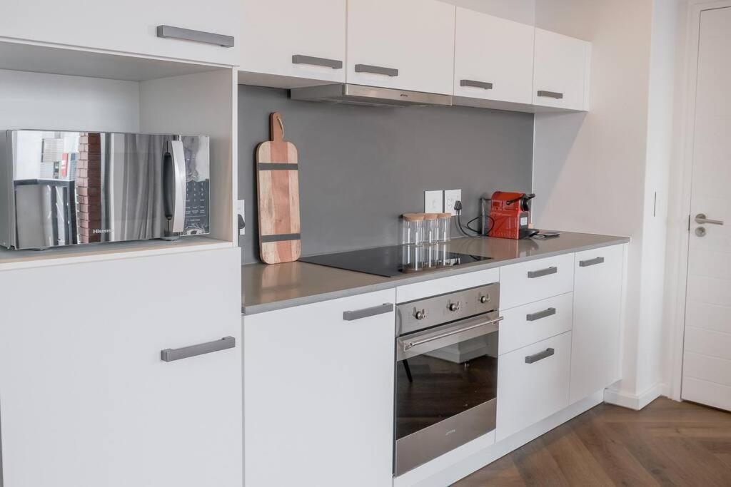 Modern Comfort In Century Apartment